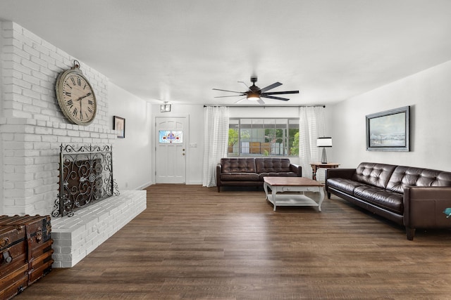 1666 Willis St, Redding, CA 96001 - living area featuring ceiling fan, dark wood-style flooring, and a brick fireplace
