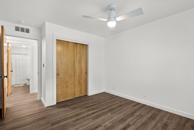1666 Willis St, Redding, CA 96001 - unfurnished bedroom with dark wood finished floors, a closet, and ceiling fan
