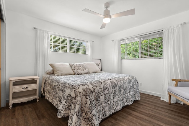 1666 Willis St, Redding, CA 96001 - bedroom with dark wood-style floors and a ceiling fan