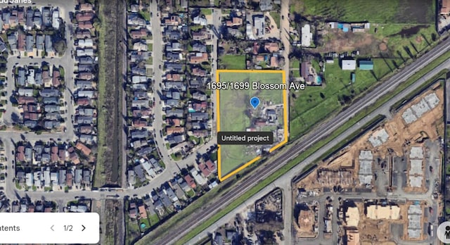 1695/1699 Blossom Ave, Fairfield, CA 94533 - aerial map of property and surrounding area featuring property parcel outlined
