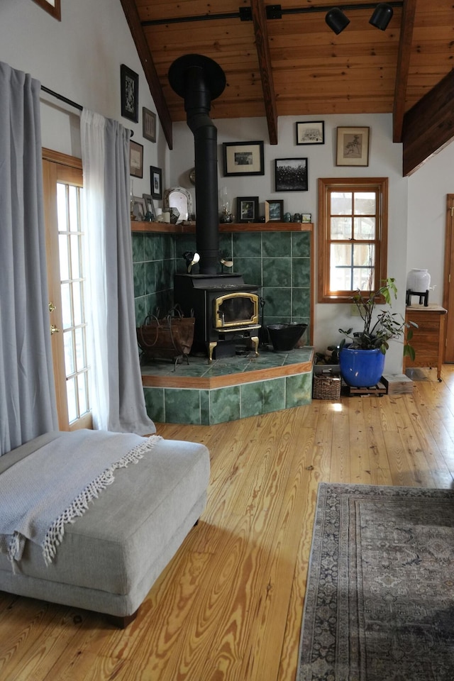 261 Salt Flat Rd, Lewiston, CA 96052 - living room featuring wooden ceiling, hardwood / wood-style floors, a wood stove, and healthy amount of natural light