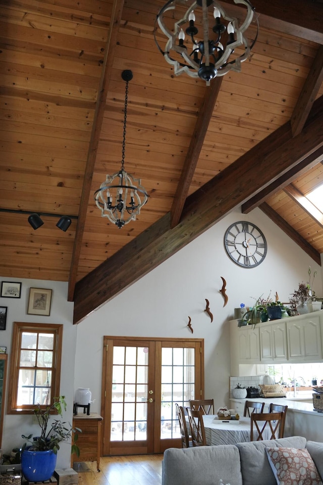 261 Salt Flat Rd, Lewiston, CA 96052 - living room with a chandelier, wooden ceiling, light wood-type flooring, and french doors