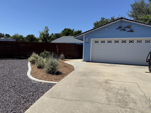 466 Tourmaline Way, Redding, CA 96003 - view of property exterior featuring a garage and an outbuilding