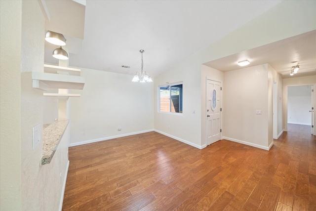 466 Tourmaline Way, Redding, CA 96003 - unfurnished living room with light wood-style floors, a chandelier, and lofted ceiling
