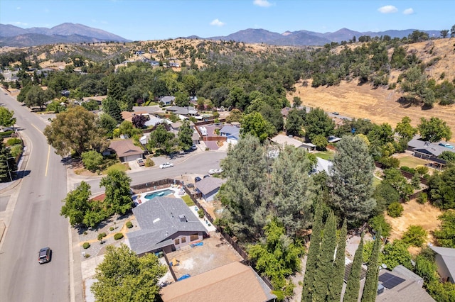 466 Tourmaline Way, Redding, CA 96003 - aerial perspective of suburban area featuring a mountainous background