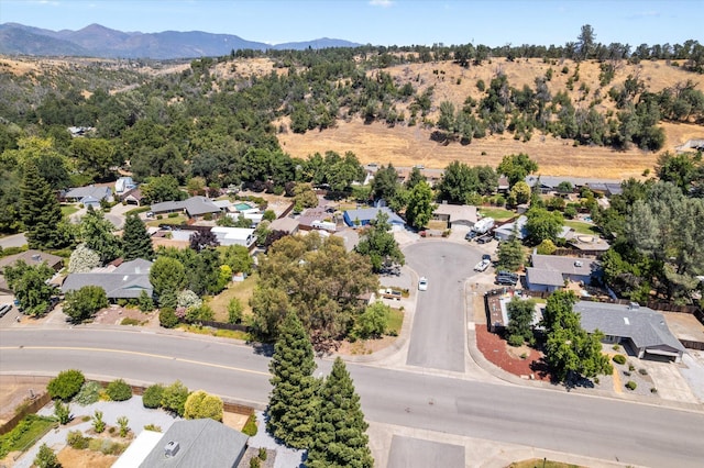 466 Tourmaline Way, Redding, CA 96003 - aerial perspective of suburban area with a mountain backdrop