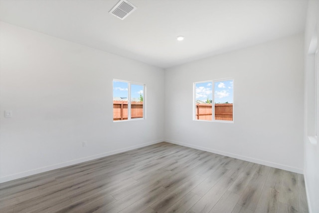 4206 Acadia Pl, Redding, CA 96001 - spare room featuring light wood finished floors, baseboards, and recessed lighting