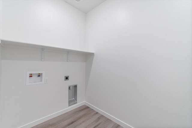 4206 Acadia Pl, Redding, CA 96001 - laundry room with washer hookup, baseboards, light wood-type flooring, and electric dryer hookup