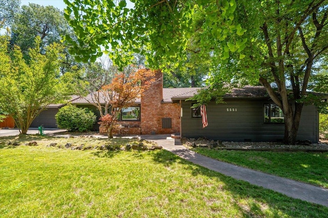 2551 S Waverly Ave, Redding, CA 96001 - single story home with a chimney and a front yard