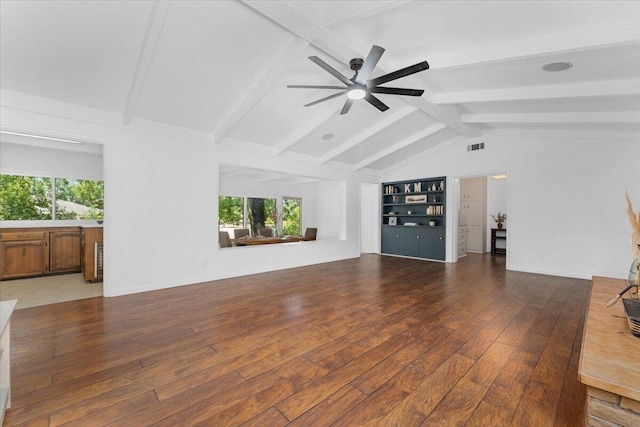 2551 S Waverly Ave, Redding, CA 96001 - unfurnished living room featuring hardwood / wood-style floors, ceiling fan, and built in shelves
