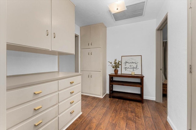 2551 S Waverly Ave, Redding, CA 96001 - spacious closet with dark wood-style flooring