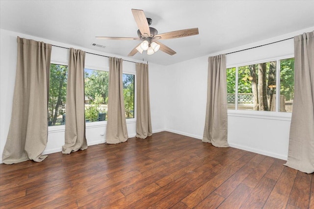 2551 S Waverly Ave, Redding, CA 96001 - spare room featuring dark wood finished floors, ceiling fan, and baseboards