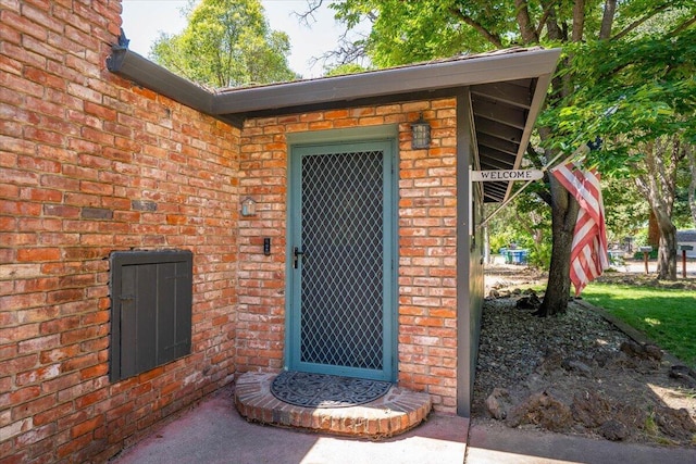 2551 S Waverly Ave, Redding, CA 96001 - doorway to property featuring brick siding