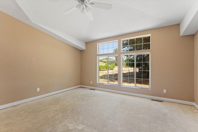 22400 E Elk Trl, Redding, CA 96003 - spare room with baseboards, unfinished concrete flooring, and ceiling fan