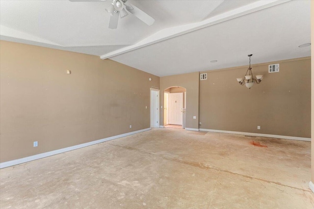 22400 E Elk Trl, Redding, CA 96003 - spare room with a chandelier, ceiling fan, arched walkways, baseboards, and concrete floors