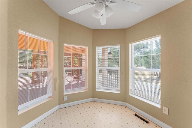 22400 E Elk Trl, Redding, CA 96003 - empty room with light flooring, ceiling fan, and baseboards