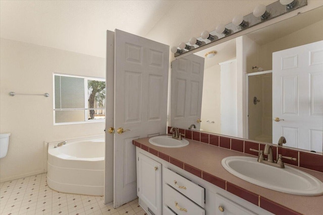 22400 E Elk Trl, Redding, CA 96003 - bathroom with a stall shower, a garden tub, tile patterned floors, and double vanity