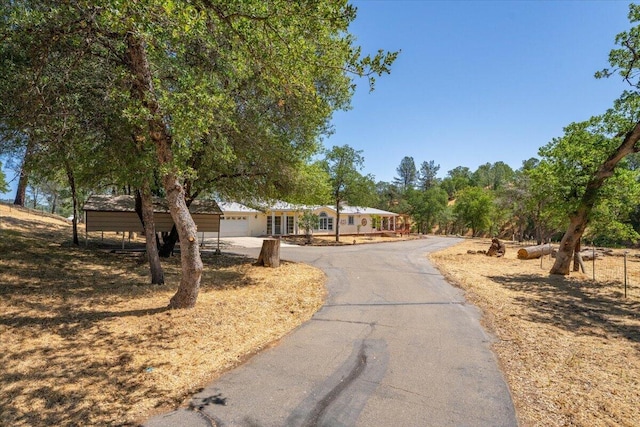 22400 E Elk Trl, Redding, CA 96003 - ranch-style home featuring driveway and a garage