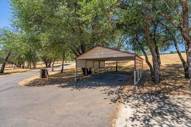 22400 E Elk Trl, Redding, CA 96003 - view of parking / parking lot with asphalt driveway and a carport