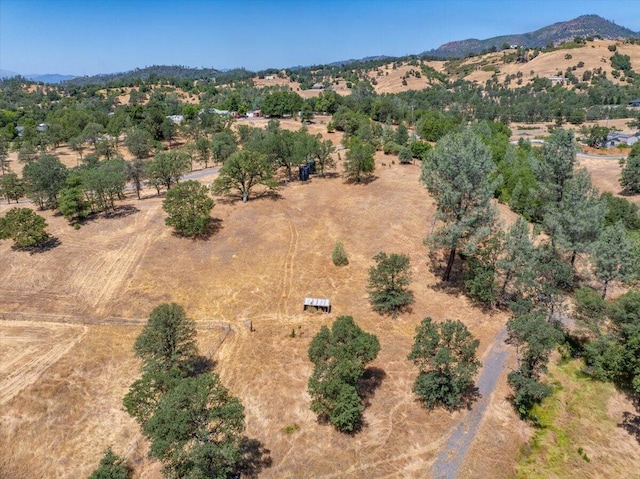 22400 E Elk Trl, Redding, CA 96003 - aerial overview of property's location featuring rural landscape and a mountainous background