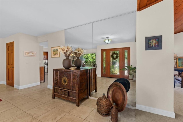 2364 La Madre Ct, Redding, CA 96002 - foyer entrance with washer / clothes dryer, light tile patterned floors, and baseboards