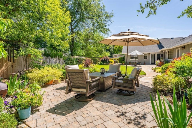 2364 La Madre Ct, Redding, CA 96002 - fenced backyard with a patio and outdoor dining space