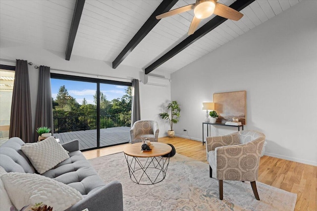 2220 Gold St, Redding, CA 96001 - living room with a wall mounted air conditioner, a ceiling fan, baseboards, and wood finished floors
