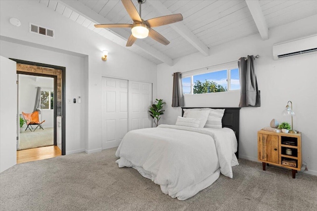 2220 Gold St, Redding, CA 96001 - bedroom featuring carpet, multiple windows, a closet, a wall unit AC, and wood ceiling