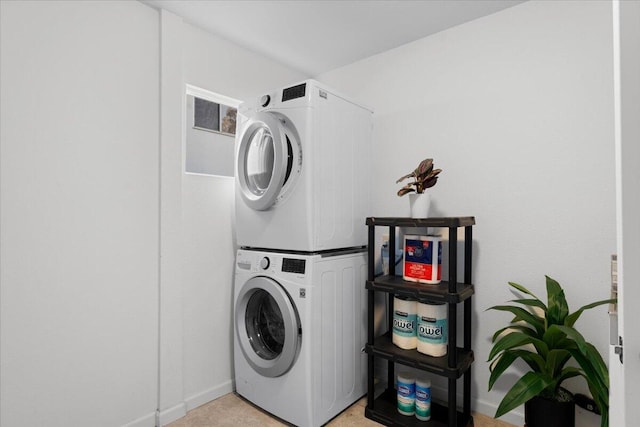 2220 Gold St, Redding, CA 96001 - laundry area featuring estacked washer and dryer and baseboards
