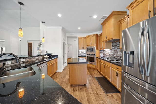 4648 Kilkee Dr, Redding, CA 96001 - kitchen with appliances with stainless steel finishes, a sink, crown molding, decorative backsplash, and recessed lighting