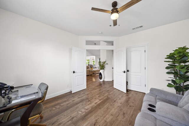 4648 Kilkee Dr, Redding, CA 96001 - office featuring a ceiling fan, wood finished floors, and baseboards