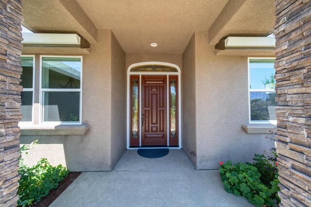 4648 Kilkee Dr, Redding, CA 96001 - view of exterior entry with stucco siding