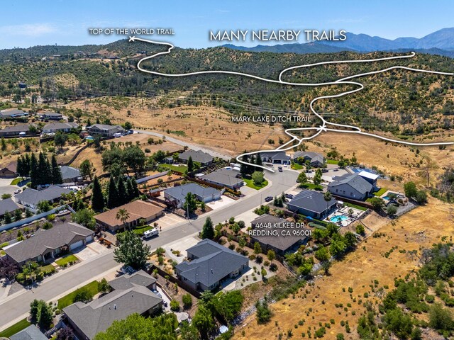 4648 Kilkee Dr, Redding, CA 96001 - aerial view of property and surrounding area with mountains and nearby suburban area