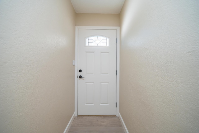 5867 Bell Rd, Redding, CA 96001 - entryway with baseboards and light wood-style floors