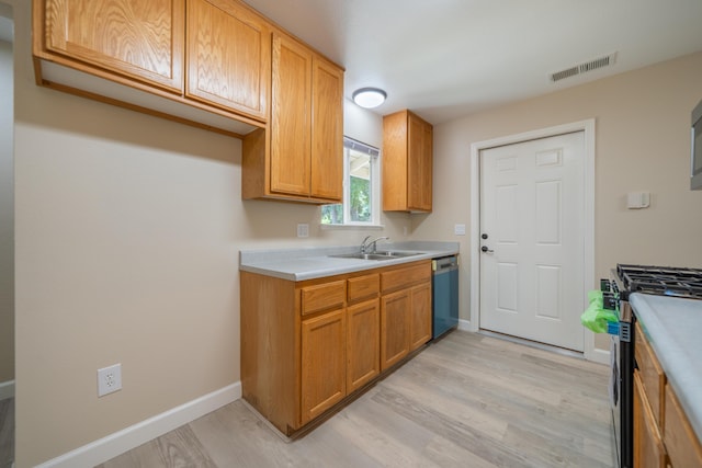 5867 Bell Rd, Redding, CA 96001 - kitchen featuring stainless steel gas stove, light countertops, a sink, and dishwasher