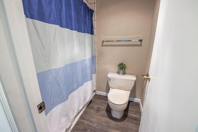 410 Ridgecrest Trl Unit 226, Redding, CA 96003 - bathroom with toilet, wood finished floors, and curtained shower