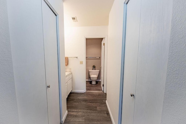 410 Ridgecrest Trl Unit 226, Redding, CA 96003 - bathroom featuring wood finished floors, toilet, vanity, and baseboards