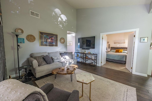 410 Ridgecrest Trl Unit 226, Redding, CA 96003 - living room with a towering ceiling, hardwood / wood-style floors, and baseboards