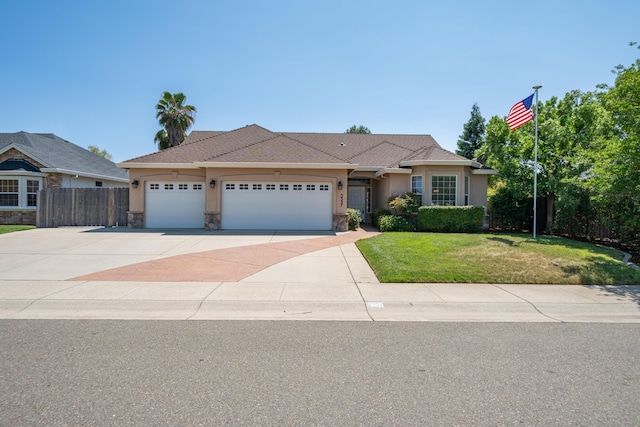 3337 Old Lantern Dr, Redding, CA 96003 - ranch-style house featuring a garage, driveway, stucco siding, and stone siding
