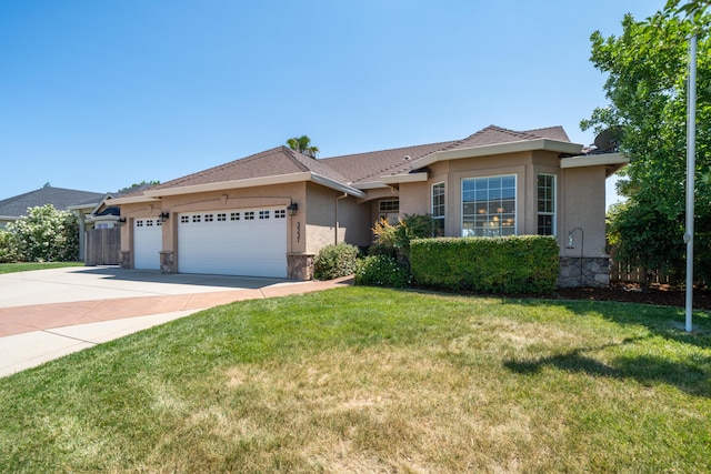 3337 Old Lantern Dr, Redding, CA 96003 - ranch-style house featuring an attached garage, stucco siding, driveway, and a front lawn