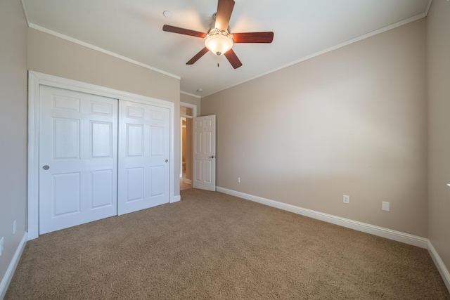 3337 Old Lantern Dr, Redding, CA 96003 - unfurnished bedroom featuring carpet, a closet, baseboards, ornamental molding, and a ceiling fan