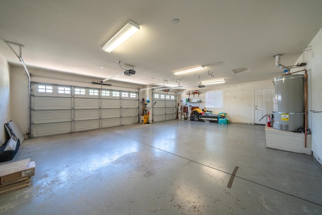 3337 Old Lantern Dr, Redding, CA 96003 - garage featuring water heater and a garage door opener