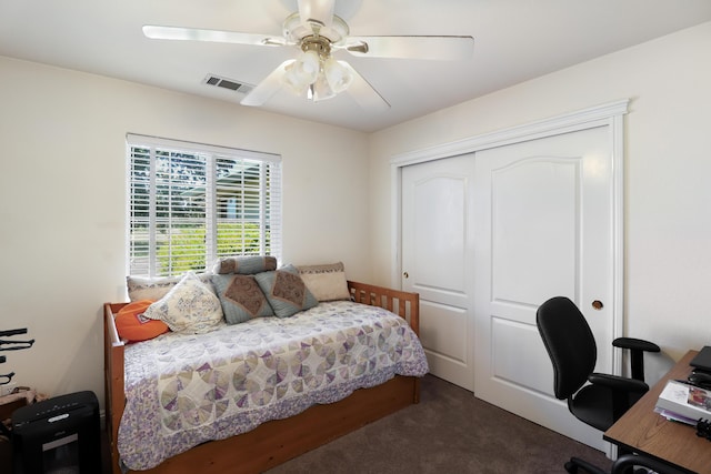 3097 Butterfly Ln, Shasta Lake, CA 96019 - bedroom with a closet, a desk, dark colored carpet, and ceiling fan