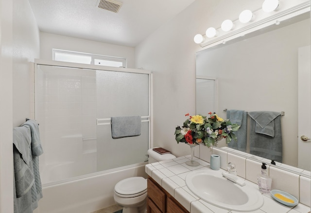 3097 Butterfly Ln, Shasta Lake, CA 96019 - full bath featuring vanity, toilet, and combined bath / shower with glass door