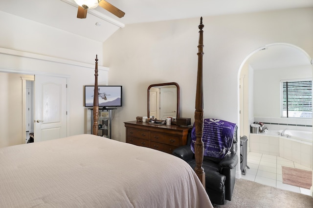 3097 Butterfly Ln, Shasta Lake, CA 96019 - bedroom with tile patterned flooring, arched walkways, carpet flooring, high vaulted ceiling, and a ceiling fan