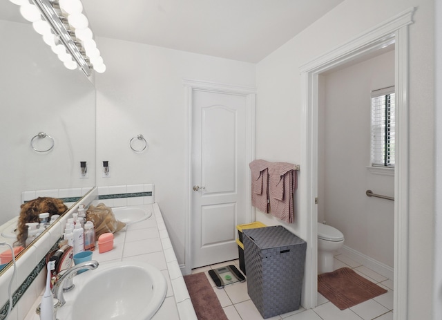 3097 Butterfly Ln, Shasta Lake, CA 96019 - bathroom with double vanity, toilet, and tile patterned flooring