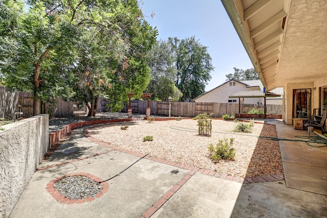 3097 Butterfly Ln, Shasta Lake, CA 96019 - fenced backyard featuring a patio area
