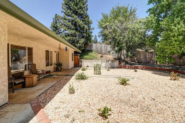 3097 Butterfly Ln, Shasta Lake, CA 96019 - fenced backyard featuring a patio area