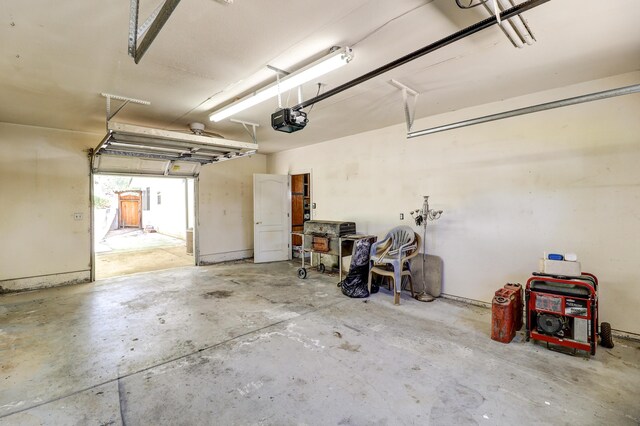 3097 Butterfly Ln, Shasta Lake, CA 96019 - garage featuring a garage door opener