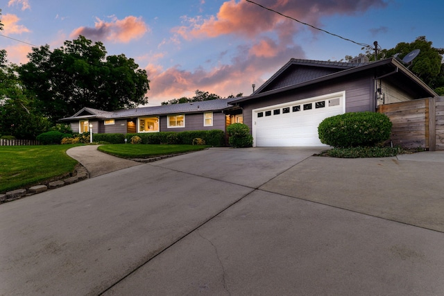 2180 Oak Ridge Dr, Redding, CA 96001 - ranch-style house featuring a garage and driveway